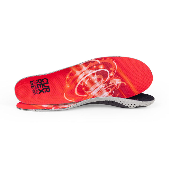 View of pair of red low profile BIKEPRO insoles, one standing on side to show top of insole, second insole set in front showing its profile while toe is facing opposite direction #profile_low