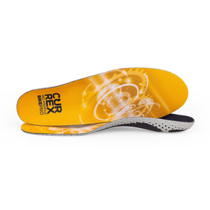 View of pair of yellow medium profile BIKEPRO insoles, one standing on side to show top of insole, second insole set in front showing its profile while toe is facing opposite direction #profile_medium