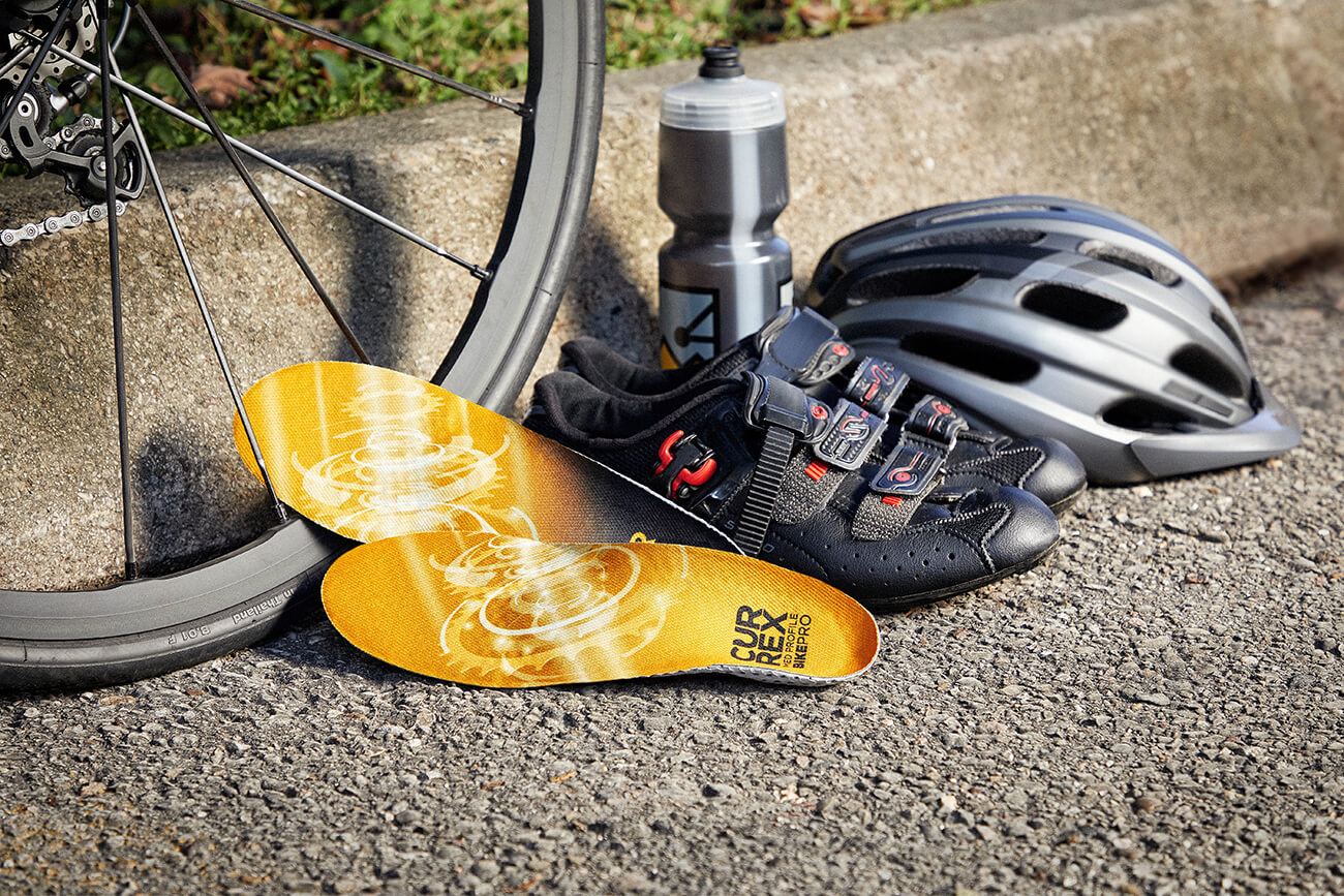 Currex BikePro insoles for bike-riding, bicycle, insoles, shoes, helmet, and water bottle for bicycling.