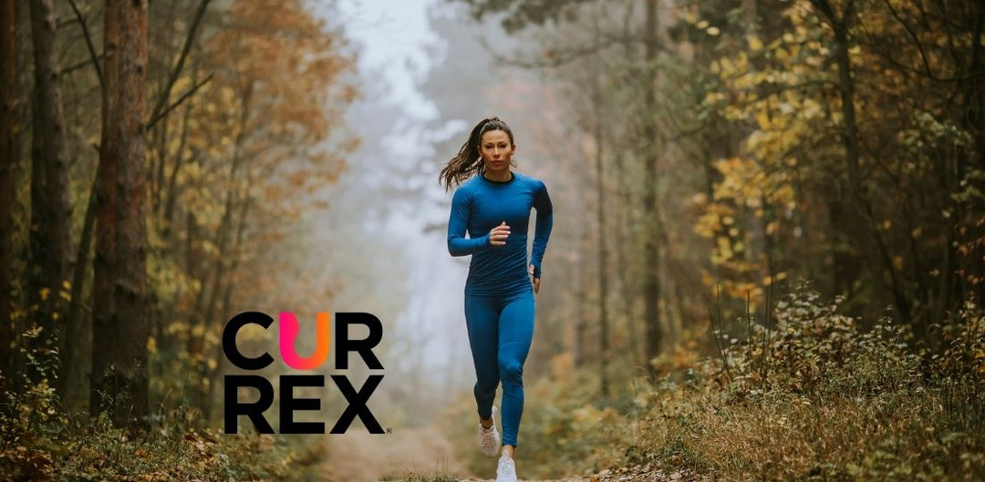 Woman running in a fall forest