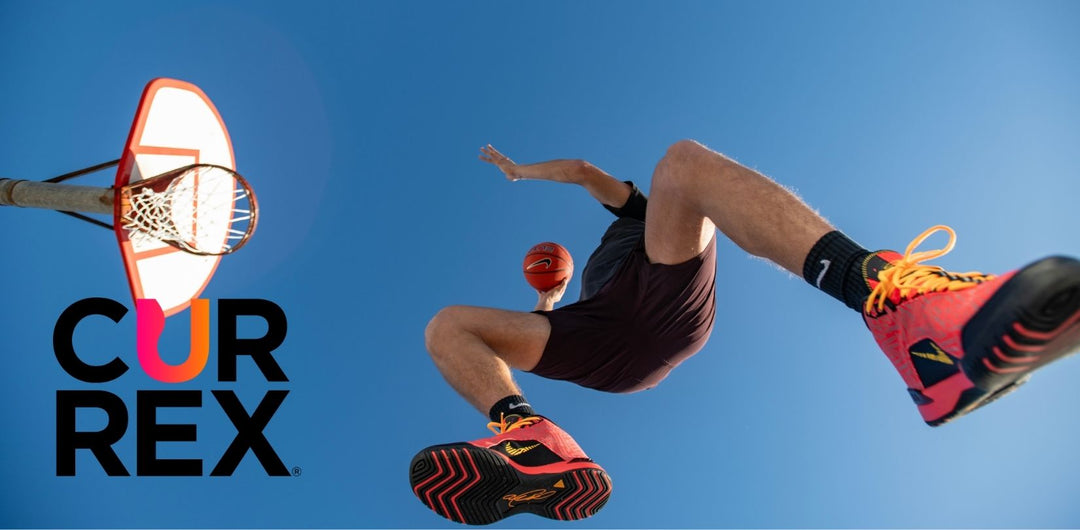 underneath view of someone dunking a basketball