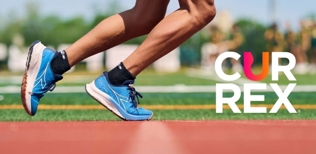 Shot of someone's feet taking off to run on the track