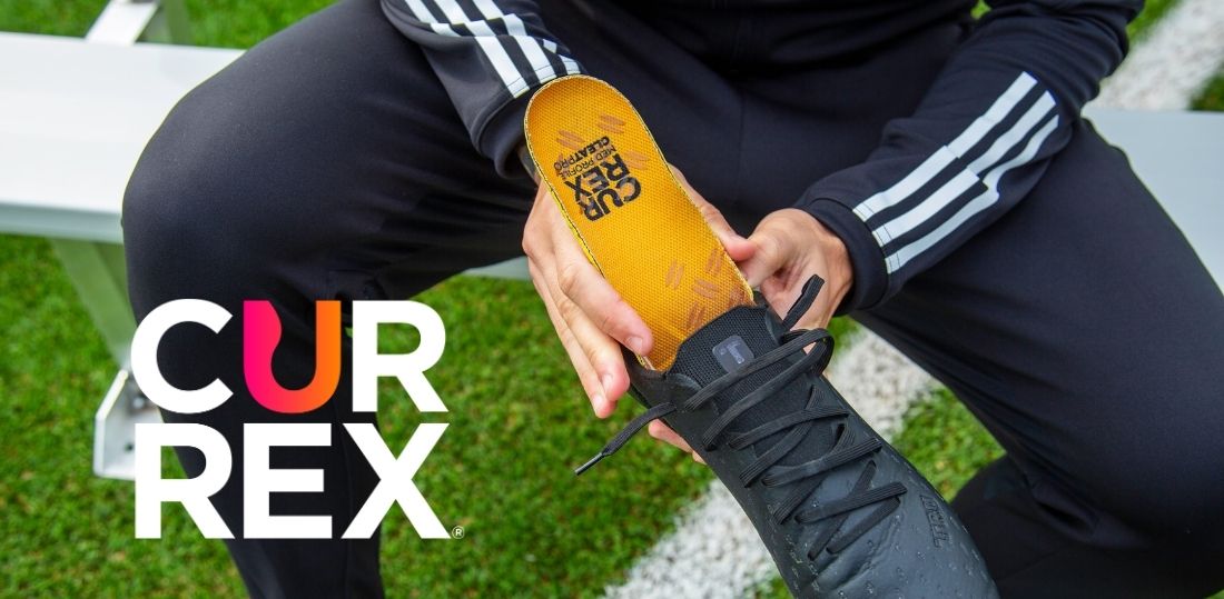 CURREX insoles going into a black cleat