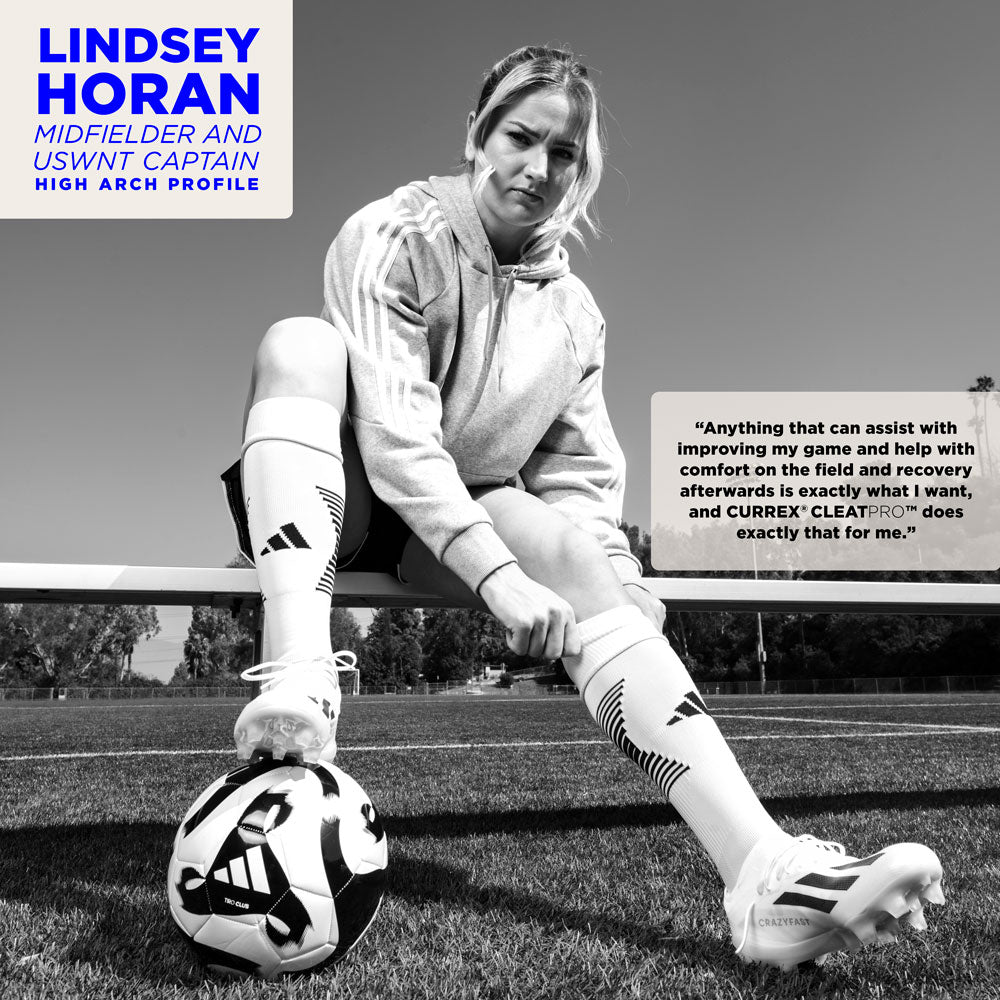 Lindsey Horan, Midfielder and USWNT Captain, uses the high profile CURREX CLEATPRO insoles. Lindsey Horan sitting on bench adjusting socks. #profile_low