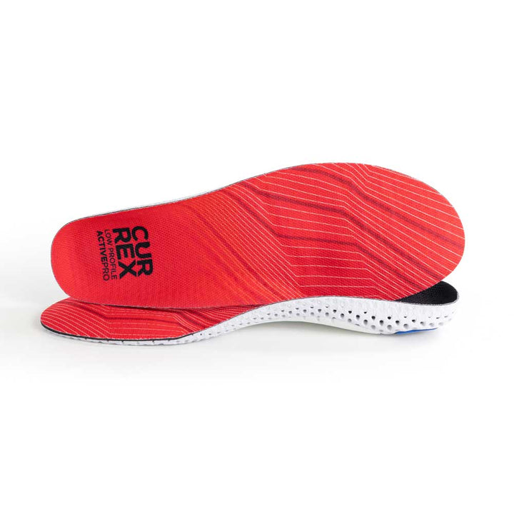 View of pair of red low profile ACTIVEPRO insoles, one standing on side to show top of insole, second insole set in front showing its profile while toe is facing opposite direction #profile_low