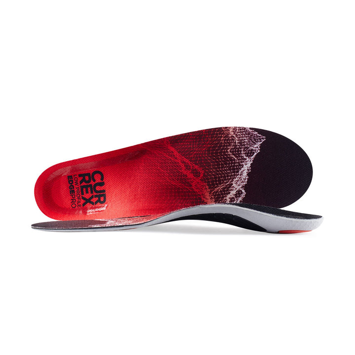 View of pair of red low profile EDGEPRO insoles, one standing on side to show top of insole, second insole set in front showing its profile while toe is facing opposite direction #profile_low