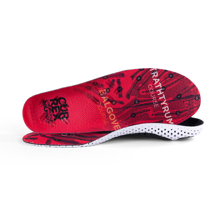 View of pair of red low profile GOLFPRO insoles, one standing on side to show top of insole, second insole set in front showing its profile while toe is facing opposite direction #profile_low