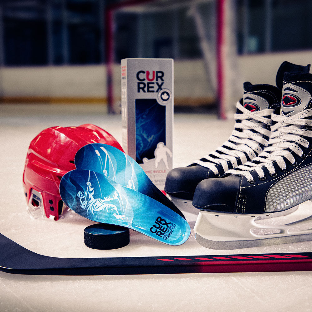 CURREX high profile HOCKEYPRO insoles next to hockey puck, hockey stick, helmet on ice rink #profile_medium