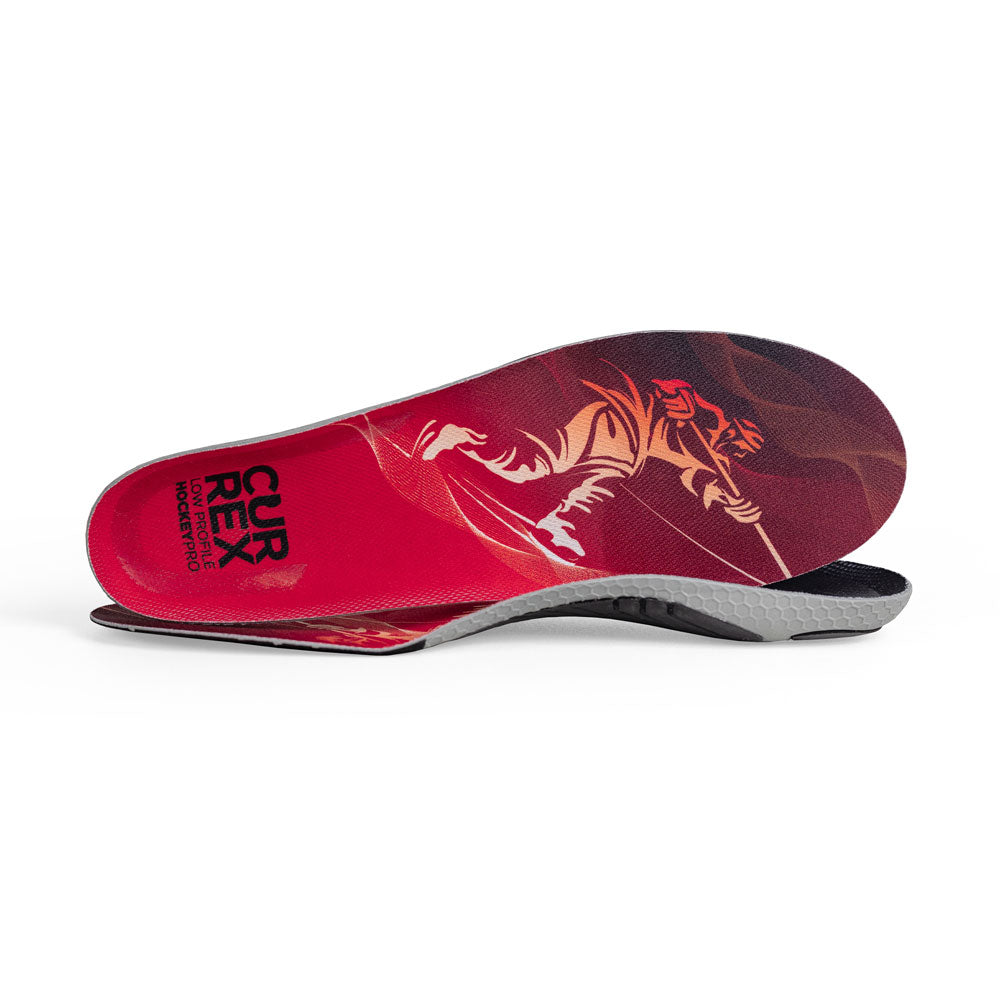 View of pair of red low profile HOCKEYPRO insoles, one standing on side to show top of insole, second insole set in front showing its profile while toe is facing opposite direction #profile_low