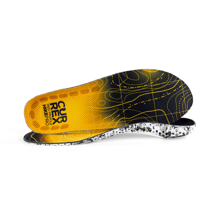 View of pair of yellow medium profile HIKEPRO insoles, one standing on side to show top of insole, second insole set in front showing its profile while toe is facing opposite direction #profile_medium