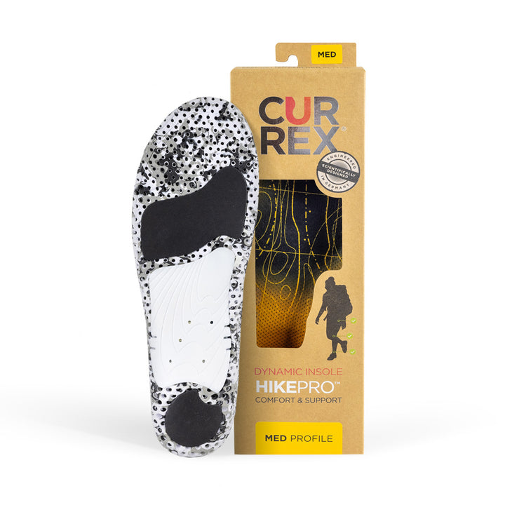 CURREX HIKEPRO insole with white and black camo base next to tan box with yellow insole inside #profile_medium