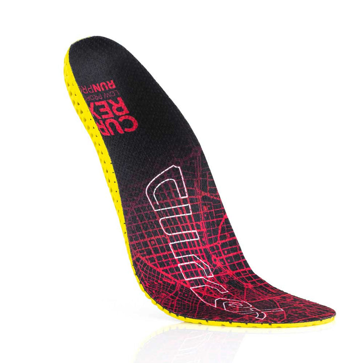 Floating top view of red colored RUNPRO low profile insoles with yellow base #profile_low