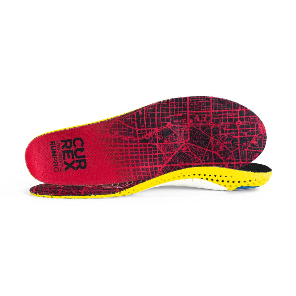 View of pair of red low profile RUNPRO insoles, one standing on side to show top of insole, second insole set in front showing its profile while toe is facing opposite direction #profile_low