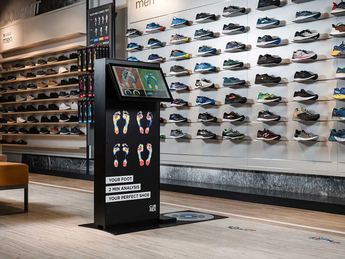 Monolith 2 minute analysis display in running shoe store.